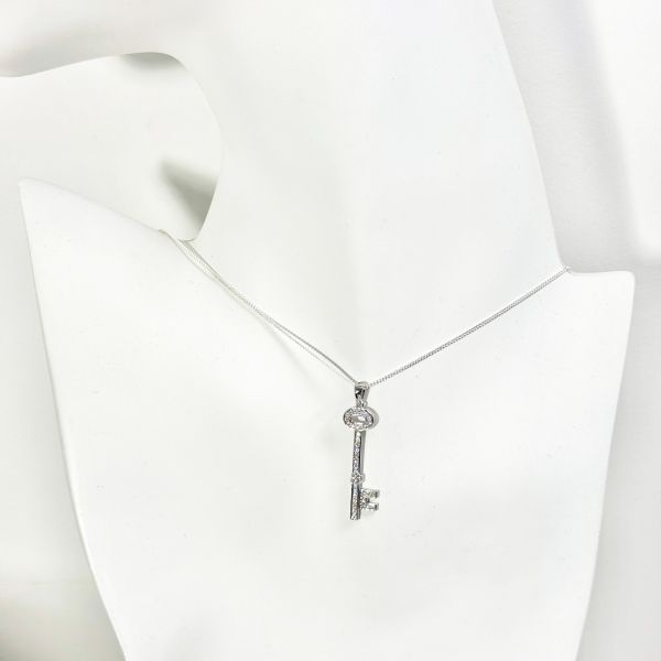 Diamond key pendant white gold sales